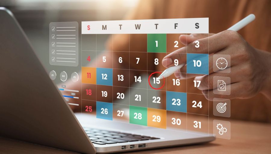 Digitale Kalenderplanung auf Laptop mit Stift: Symbolbild für Zeitmanagement, Terminorganisation und effizientes Projektmanagement. 